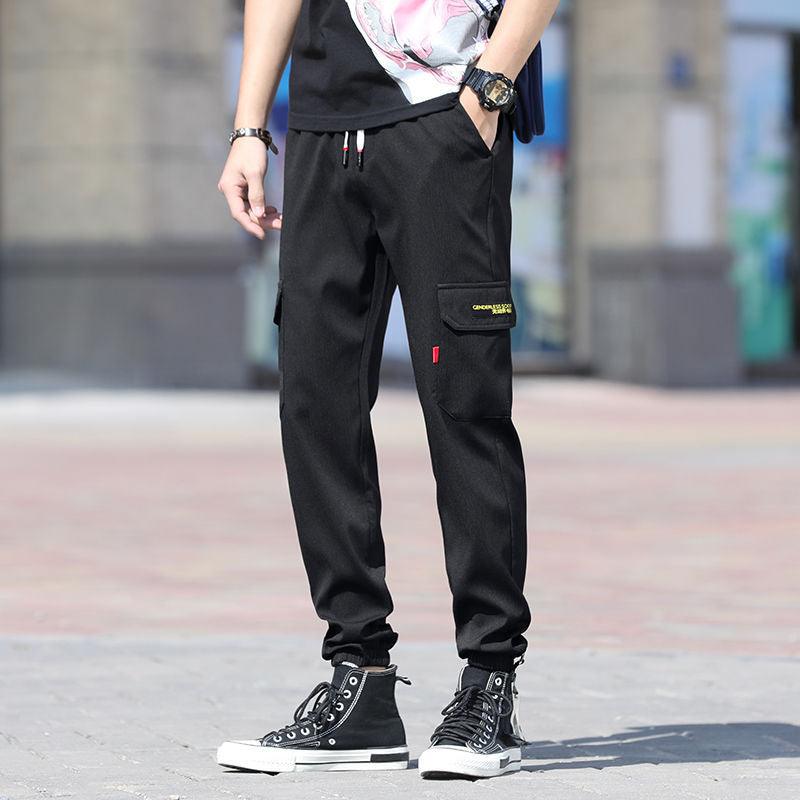 Teenage slim cargo trousers, black with drawstring waist and ankle cuffs, side pocket detail