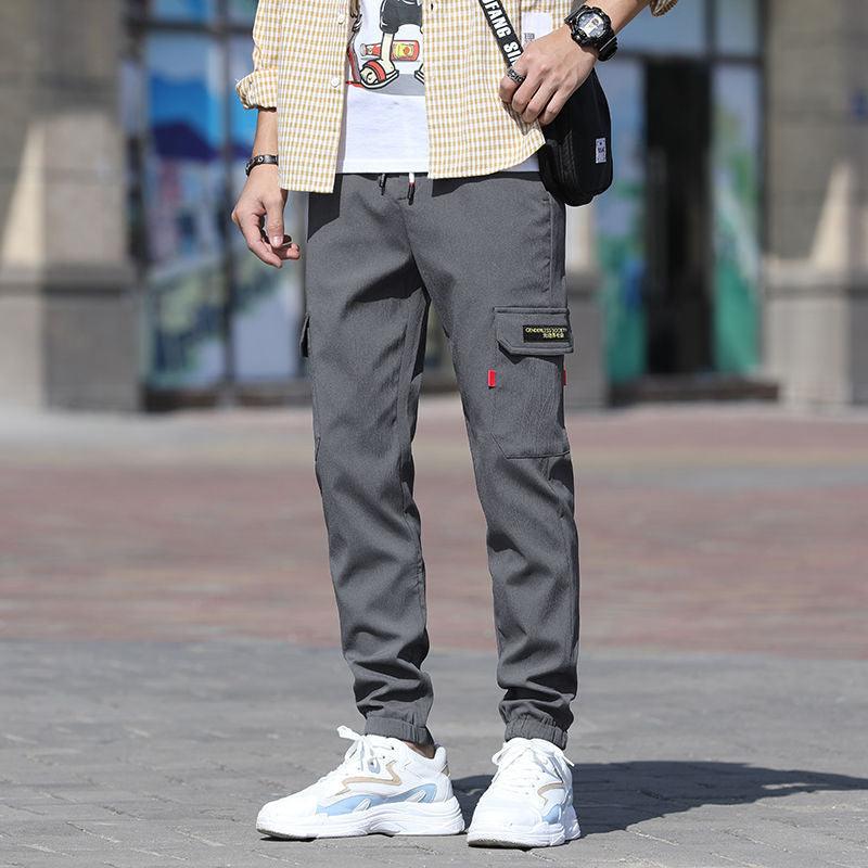 Teenage slim cargo trousers, dark gray with drawstring waist and ankle cuffs, side pocket detail