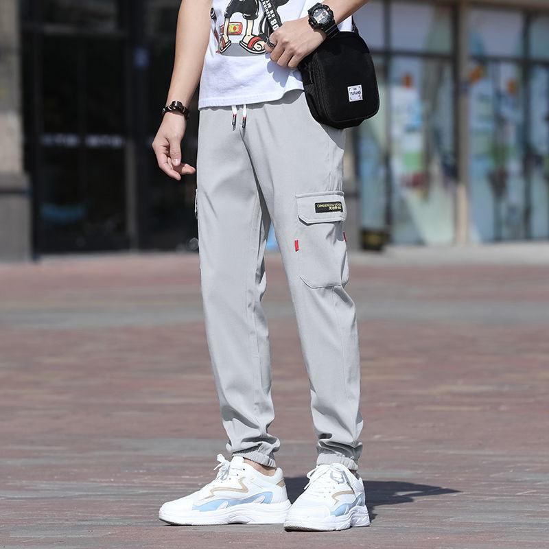 Teenage slim cargo trousers, light gray with drawstring waist and ankle cuffs, side pocket detail