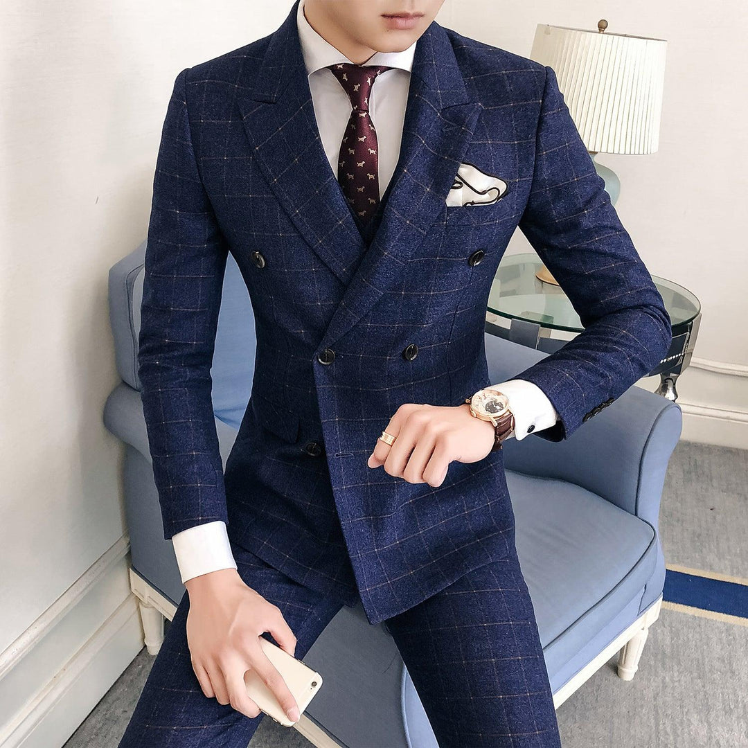 Men's three-piece plaid slim suit in dark blue with vest, tie, and pocket square