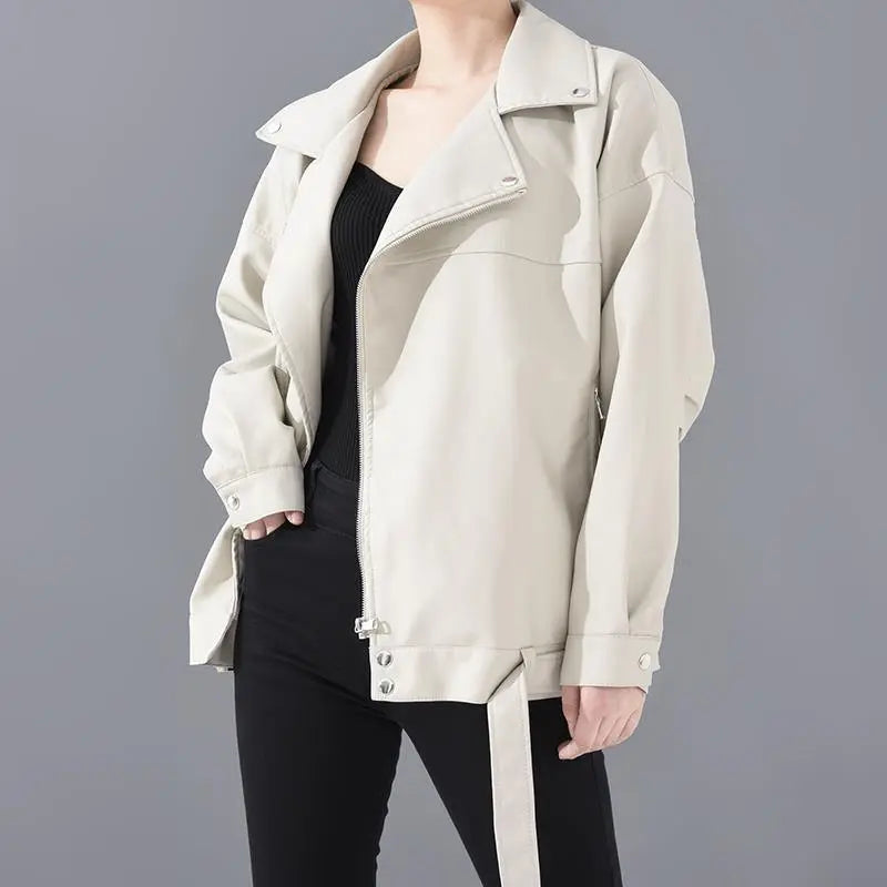 Cream leather jacket with stand collar, zip front, and flap chest pockets