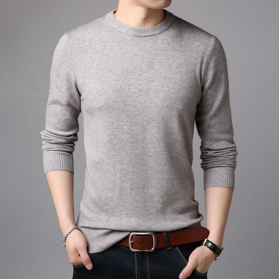 Men's light grey round-neck knit sweater with ribbed cuffs and hem.