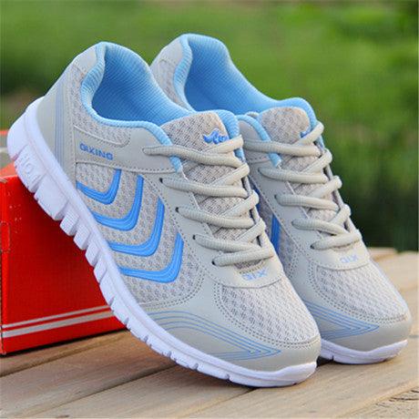 Women’s mesh lace-up flat sneakers, white with blue laces and blue logo details
