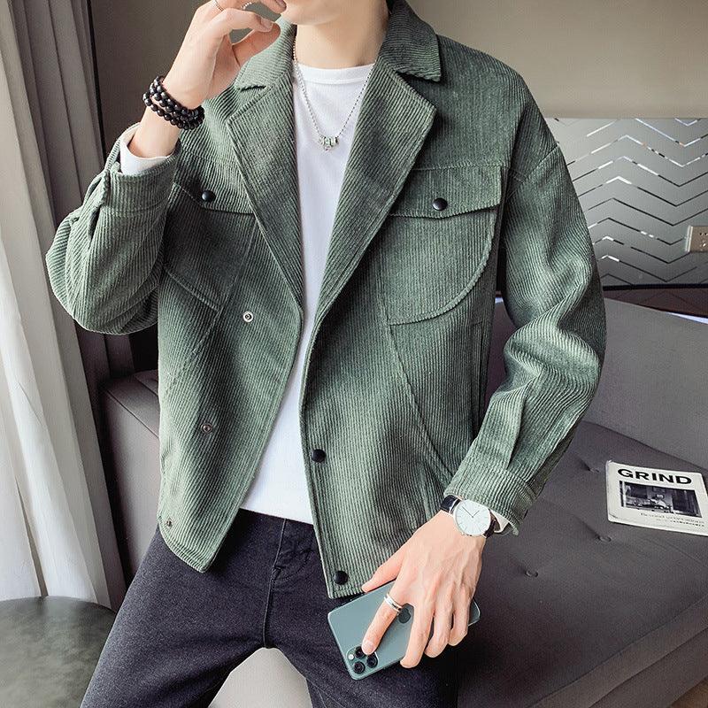 Green corduroy jacket with button front and flap chest pockets, straight hem and cuffs.