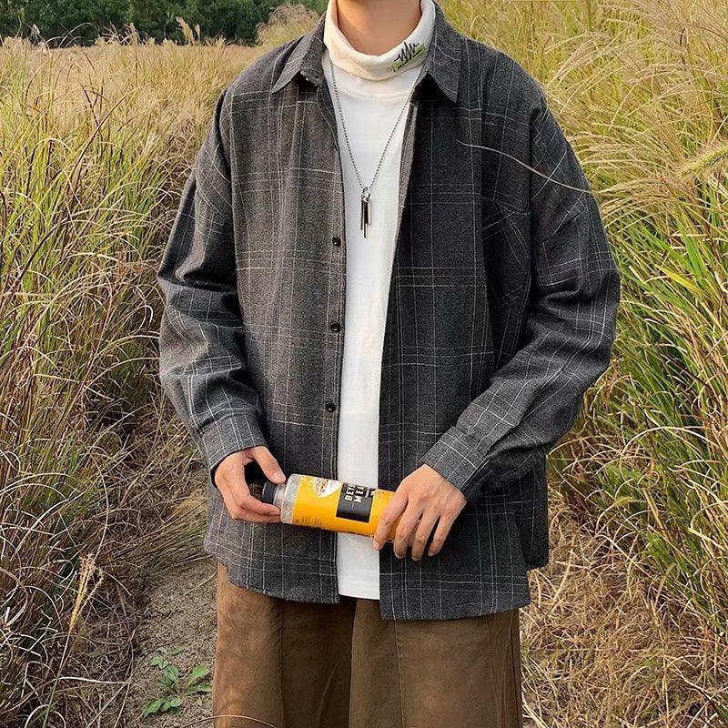 Men's black plaid casual button-up shirt with spread collar and long sleeves