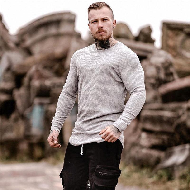 Light grey long-sleeve ribbed t-shirt with crew neck and fitted slim design