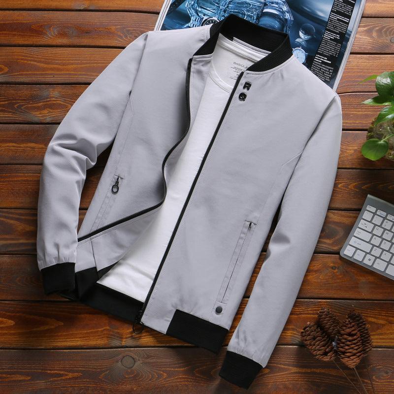 Men's light gray stand-up collar bomber jacket with full zip and ribbed trim