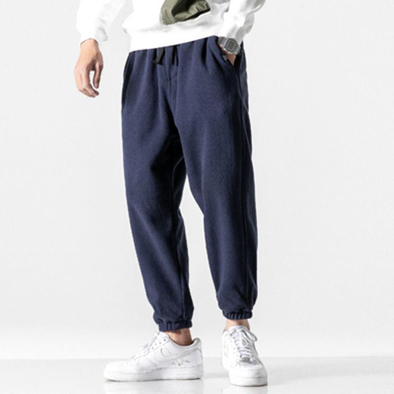 Navy harem pants with elastic waistband and gathered cuffs