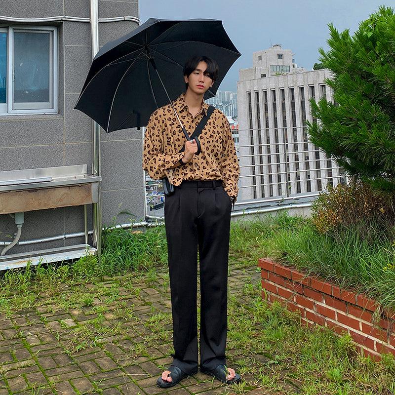 Men's leopard-print button-up shirt with long sleeves and collared front
