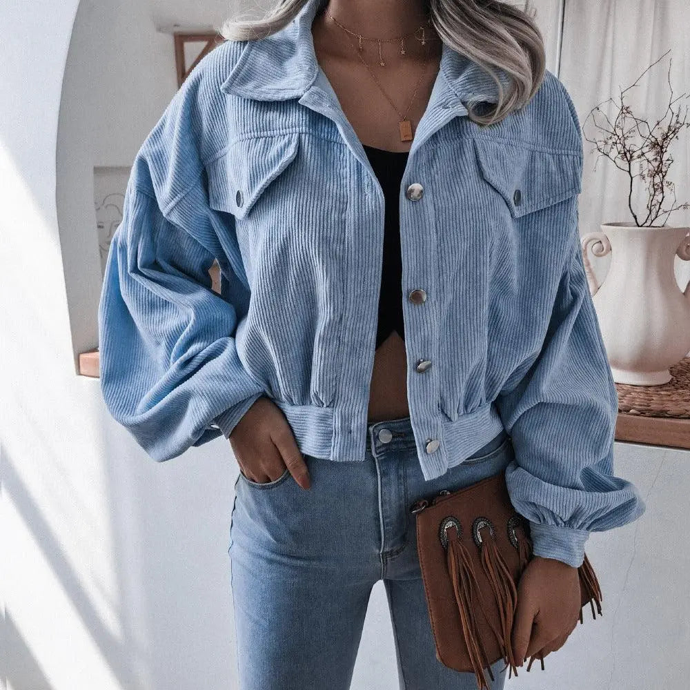 Light blue corduroy short jacket with snap buttons and flap chest pockets