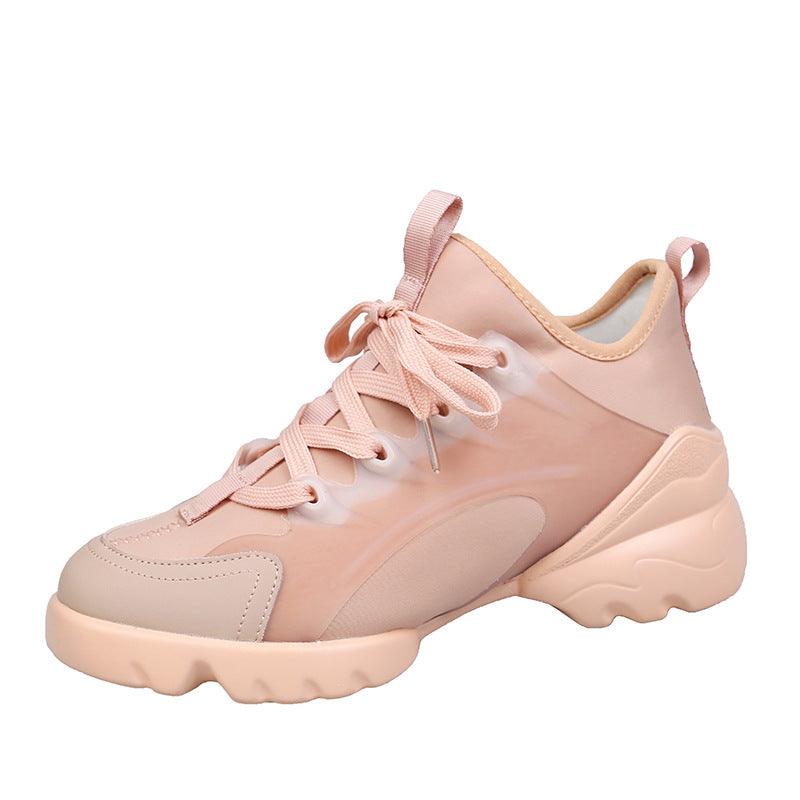 Light pink platform sneakers with lace-up front and cushioned chunky sole