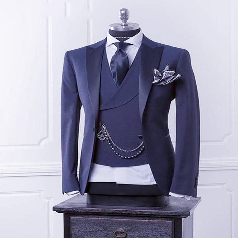 Navy three-piece suit with jacket, vest, dress shirt, black tie, and pocket square