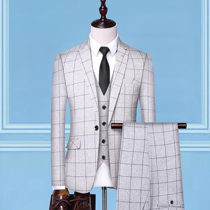 Men's 3-piece suit in light gray windowpane plaid with matching vest and dark necktie