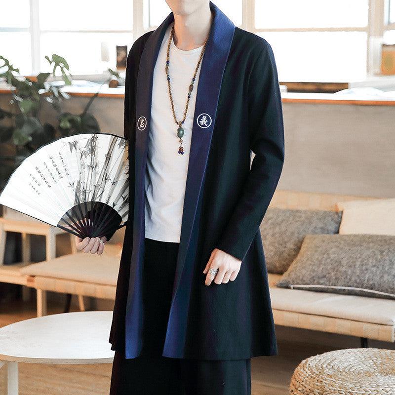 Black embroidered trench coat jacket with blue lapel trim, front patch details, open front
