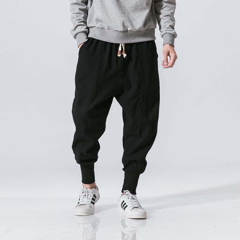 Mens black harem pants with drawstring waist and elastic ankle cuffs