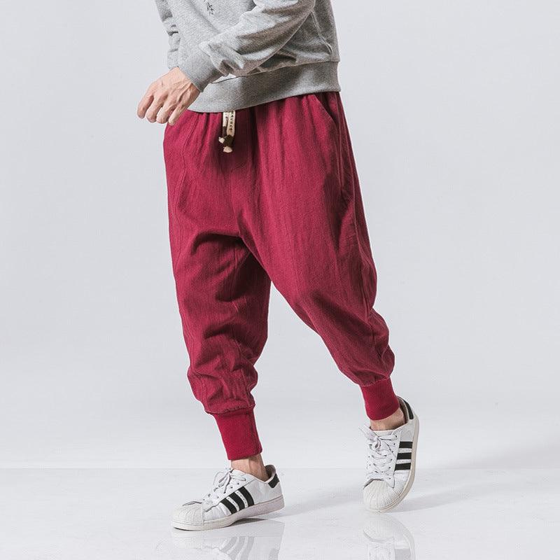 Mens red harem pants with drawstring waist and tapered elastic ankle cuffs