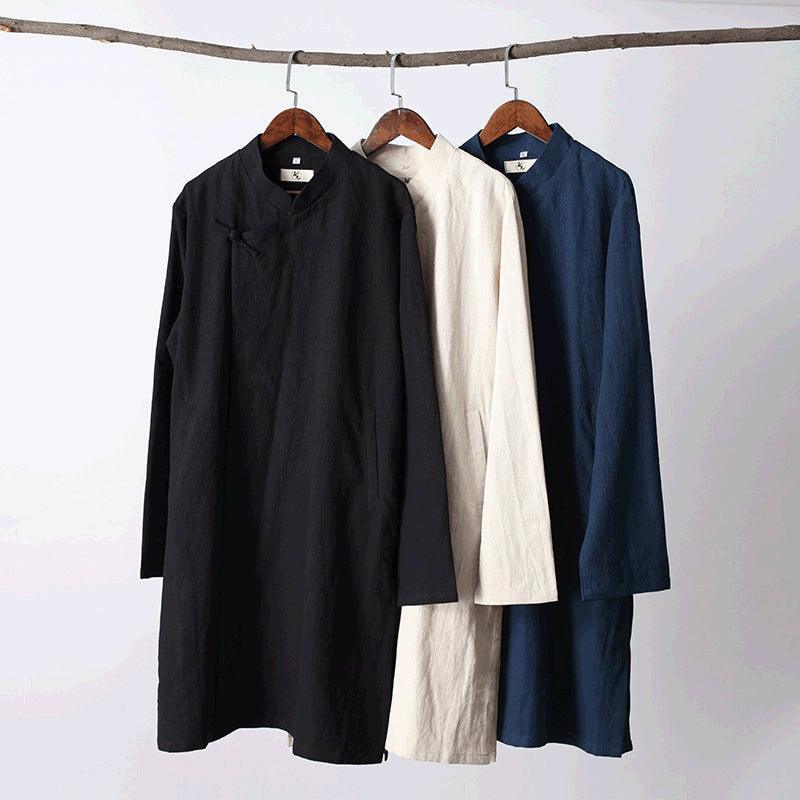 Ramie tunic shirts in black, white, and blue with banded collar and long sleeves.
