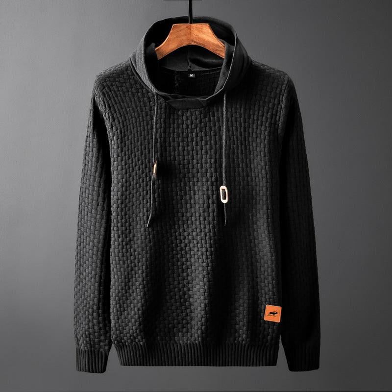 Men's pullover sweater, black textured knit, hood with drawstrings and ribbed cuffs.
