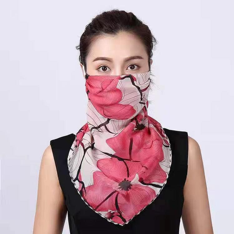 Pink floral sunscreen face mask, draped scarf style with black trim and face-covering panel.