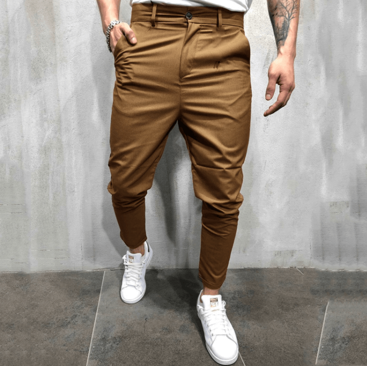 Camel brown slim casual pants with button waist, tapered legs, and side pockets