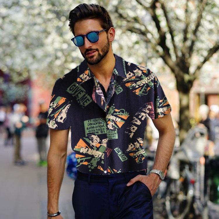 Men's navy short-sleeve button-up shirt with colorful text graphic, loose fit