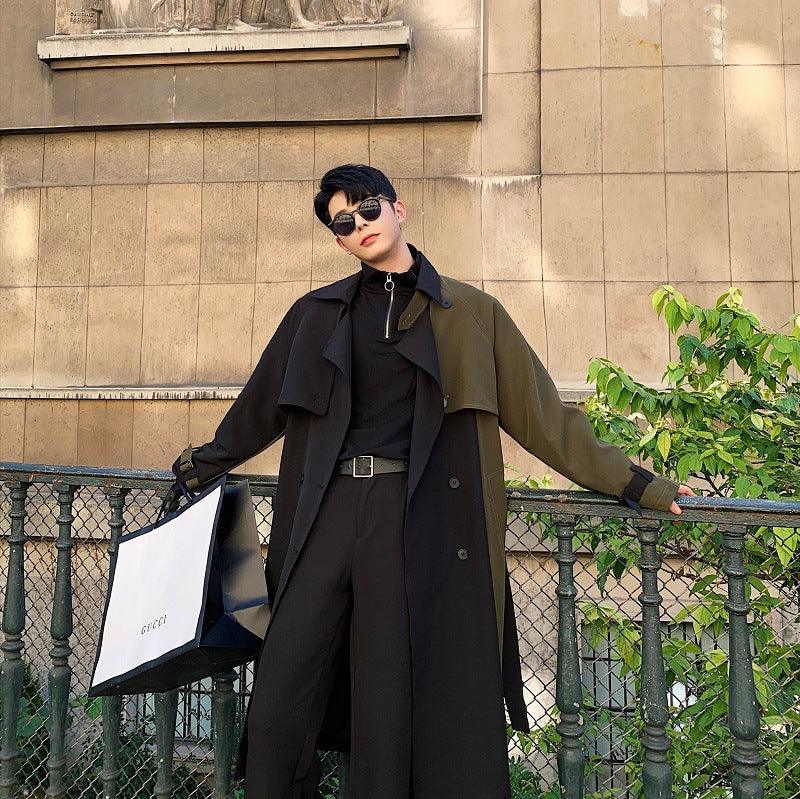 Color-block trench coat in black and olive, belted, button-front with epaulets.