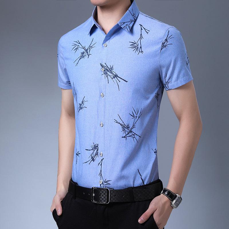 Men's blue short-sleeve button-up shirt with black bamboo-style print