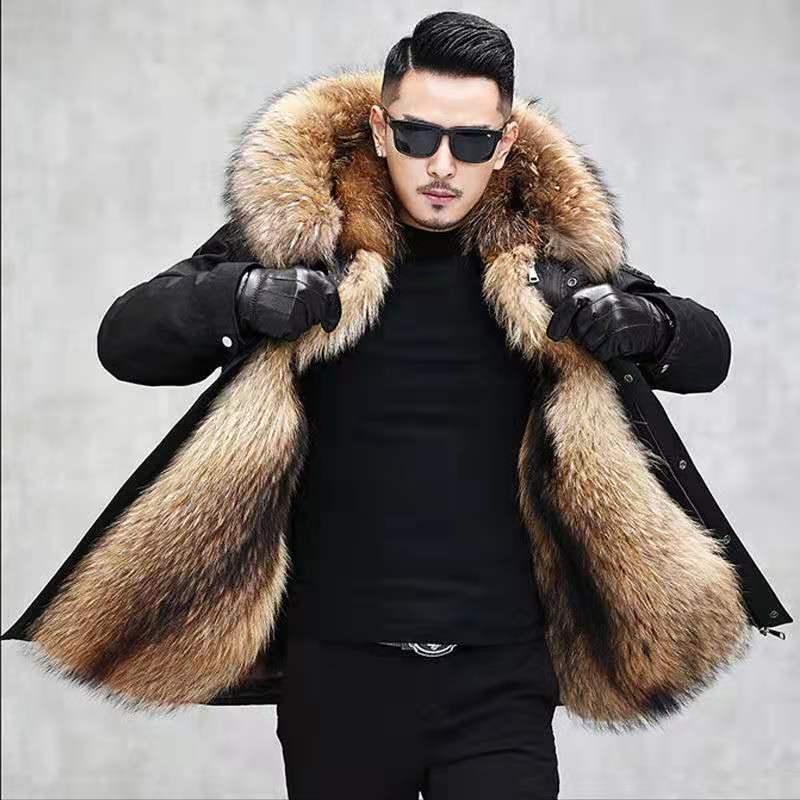 Men's black parka styling with open tan fur-trimmed hood and insulated outer coat