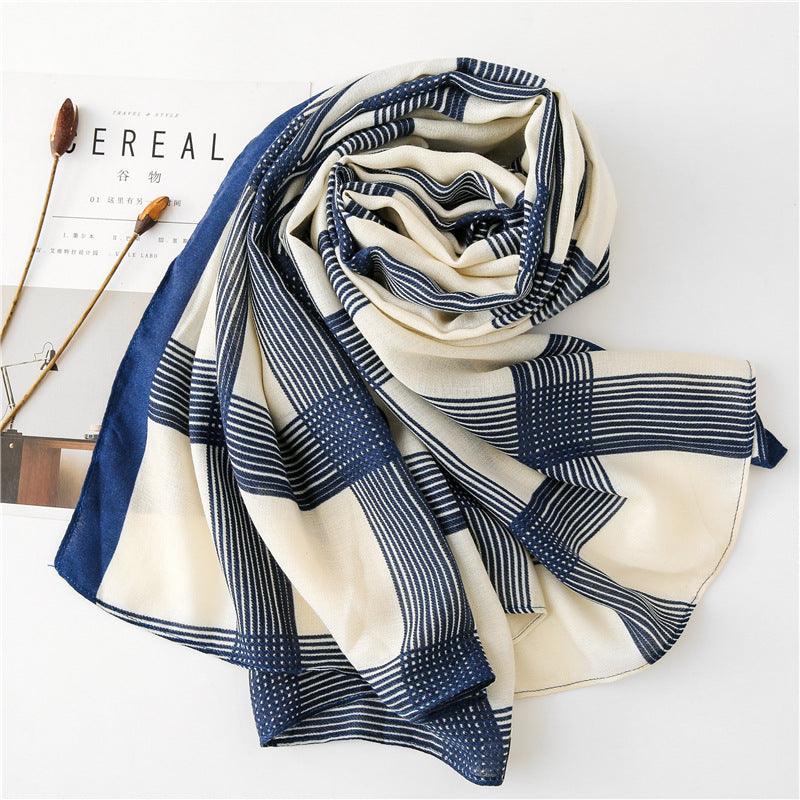 Silk scarf in navy and cream with horizontal stripes and dotted accents