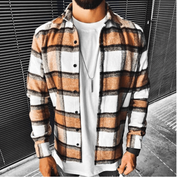 Men's plaid wool shirt in brown, black, and white checks; button front, chest pockets