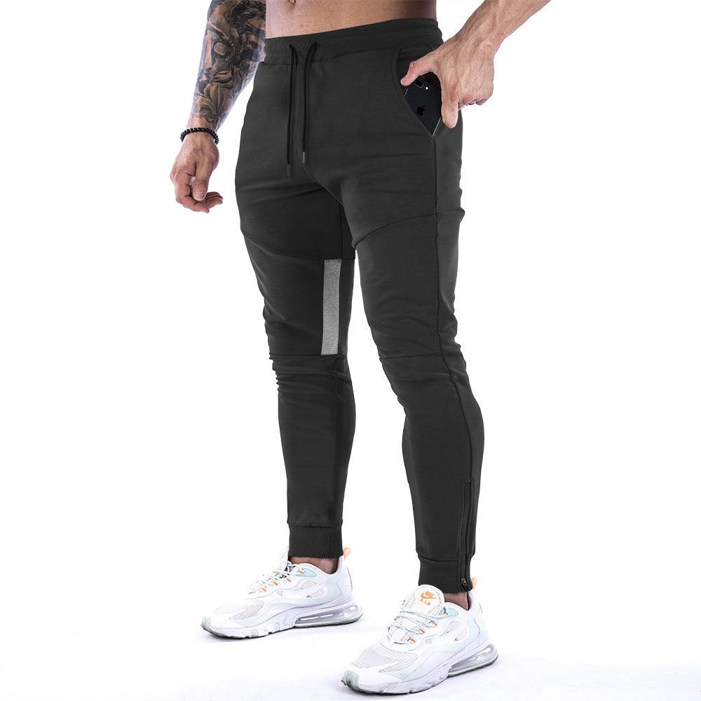 Men's fitness trousers in black, drawstring waist, cuffed jogger hems