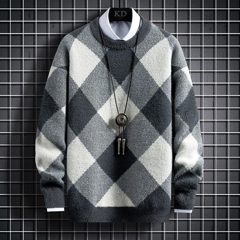 Gray and cream argyle sweater with ribbed crew neck, long sleeves, and button detail