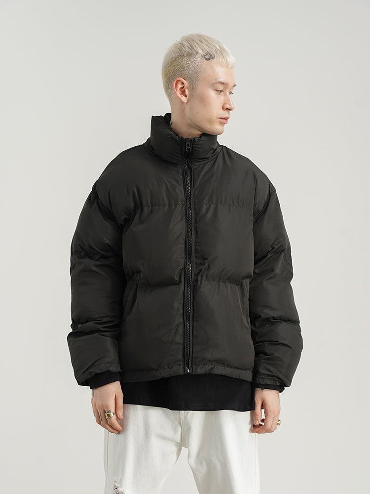 Black padded stand-up collar zip jacket, side view