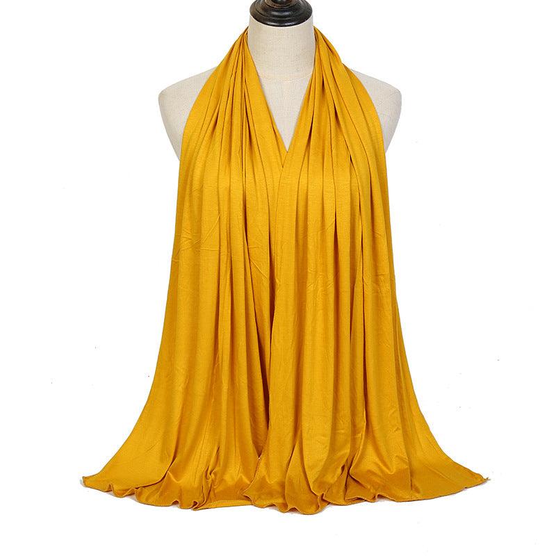 Mercerized cotton ladies headscarf in yellow, wide pleated wrap with long ends