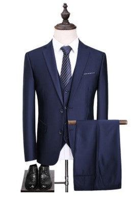 Mens navy suit jacket with matching vest, blue striped tie, and navy trousers set