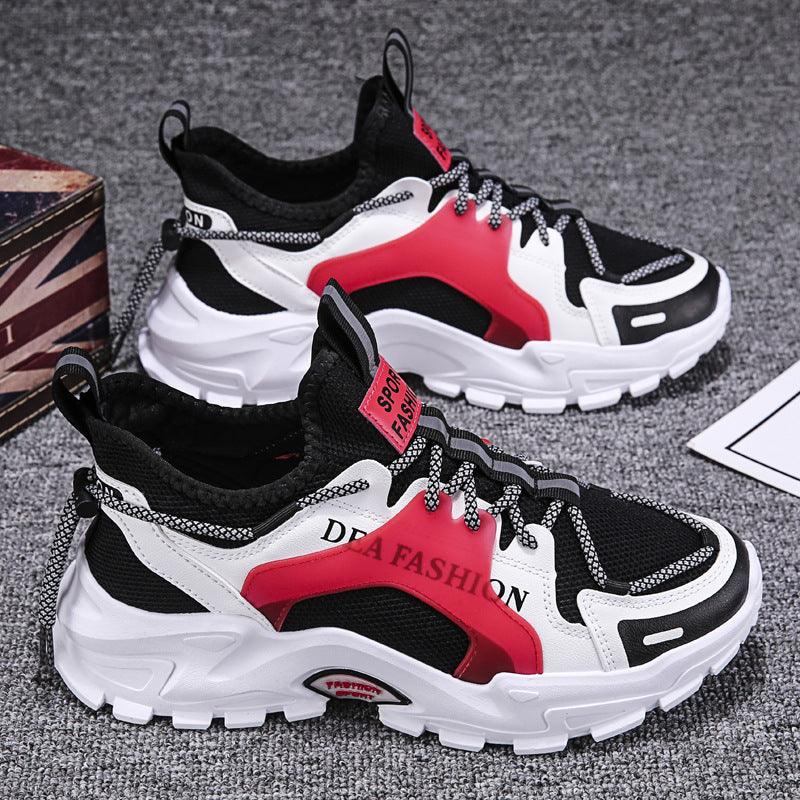 Black and white chunky luminous sneakers with red center stripe and lace-up