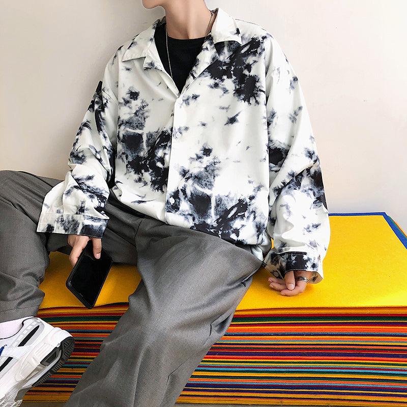 Loose long-sleeved shirt in black-and-white tie-dye with open collar and button front