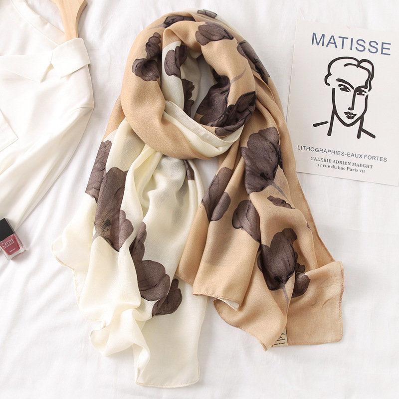 Silk scarf in cream with oversized taupe abstract shapes, soft wrapped drape