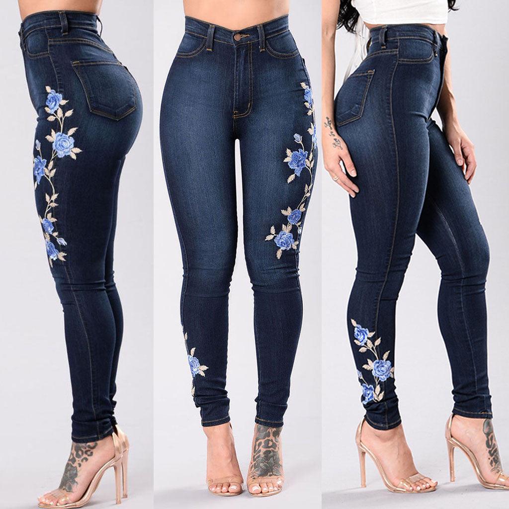 Dark blue skinny jeans with floral embroidery on the legs (multiple angles)