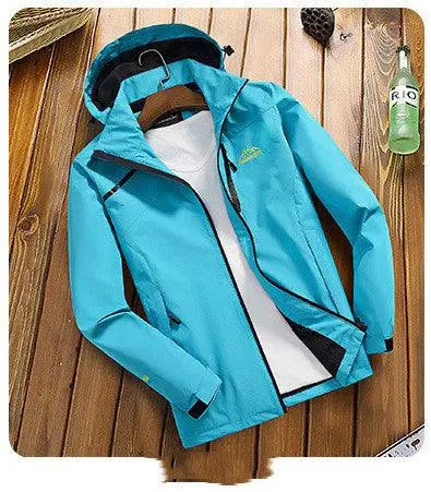 Blue mountaineering layer jacket with hood, zip front, and black trim