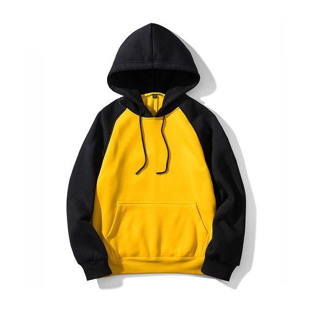 Colorblock hoodie with black hood and sleeves, yellow body; kangaroo pocket, drawstring.
