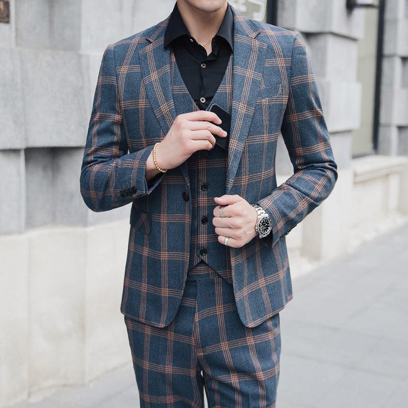 Plaid blazer with vest and trousers, blue and tan check pattern, button front close-up