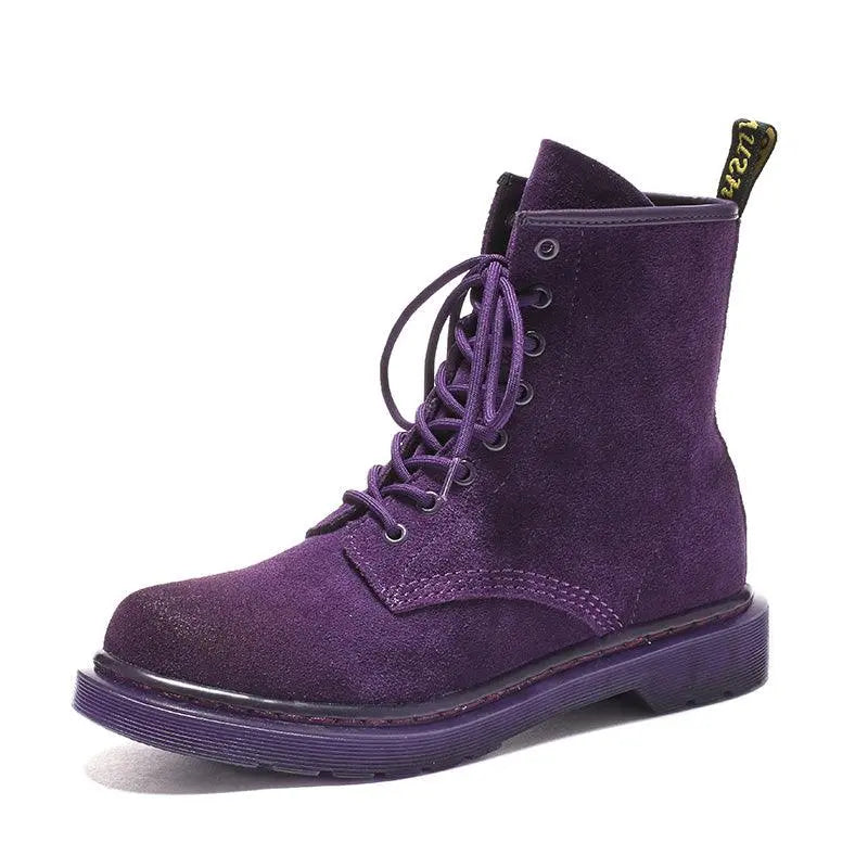 Purple suede lace-up ankle boots with chunky dark sole and side pull tab