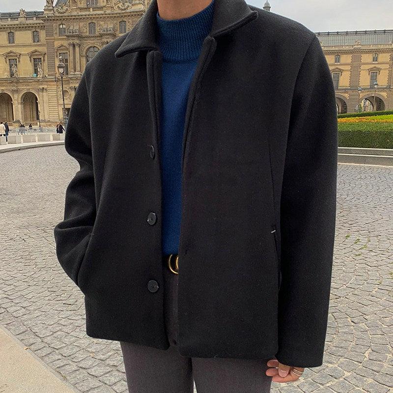 Black short wool windbreaker jacket, button-front with stand collar, chest flap pockets