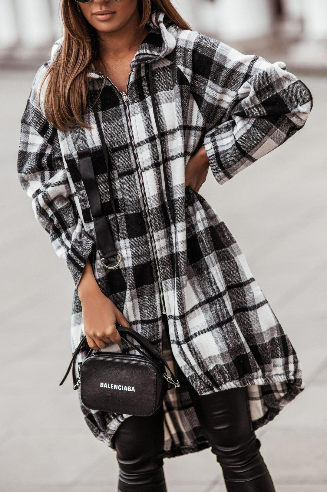 Black-and-white plaid hooded zip-up jacket dress with elastic cuffs and front zipper