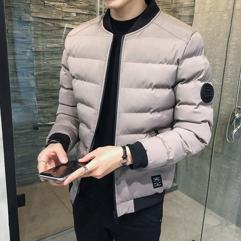 Light beige men's stand collar down jacket, full-zip quilted puffer with badge patch.