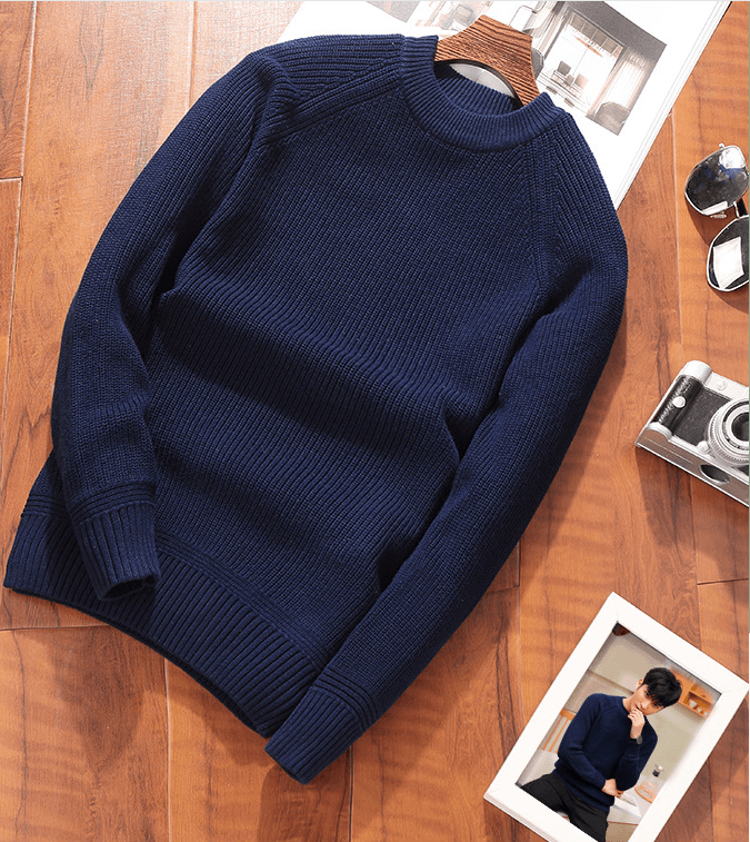 Men's crew-neck sweater in navy knit with ribbed crew neck, cuffs, and hem.