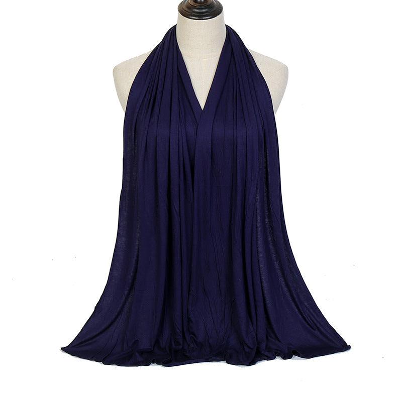 Mercerized cotton ladies headscarf in navy blue, flowing pleated fabric with V opening