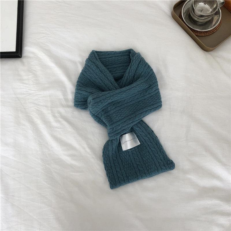 Thick knit cashmere scarf, teal blue cross-wrap, ribbed texture