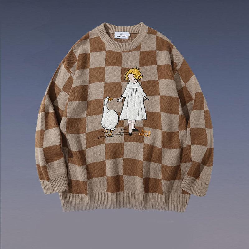 Crew neck sweater in tan and brown checker knit, cartoon girl and goose graphic